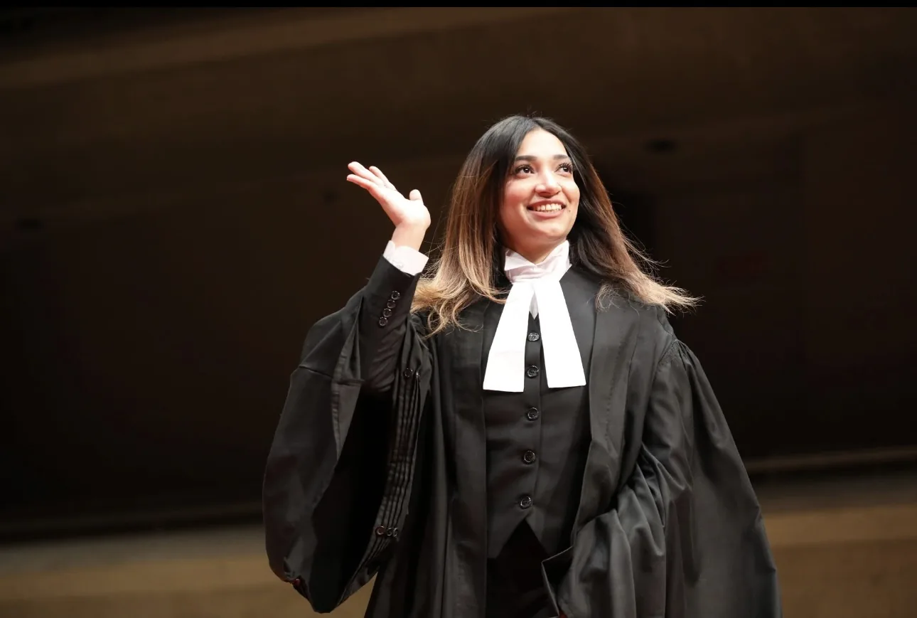 Anishba Sohail in barrister's robes at her call to the Bar of Ontario